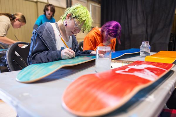 Teen Skateboard Deck Painting with Rivka Landsberg, Elk Valley Pride Festival